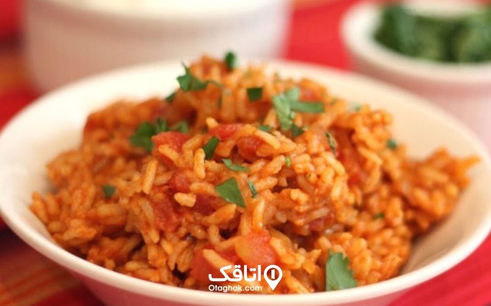 مهم‌ترین نکته در پخت گوجه پلو ایلامی، استفاده از برنج عنبربو است.